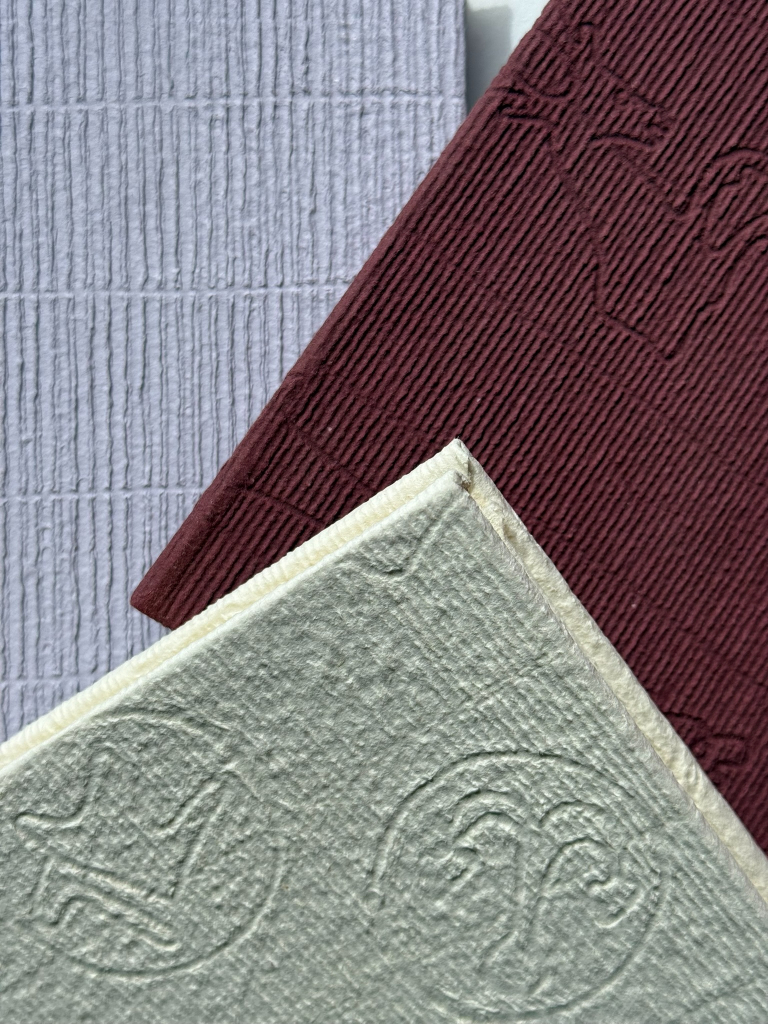 Hand-bound booklets - with laid cover